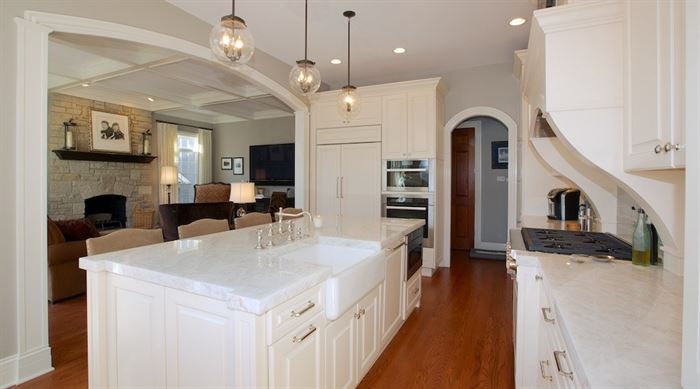 Hinsdale kitchen renovation featuring white cabinets and countertops and a coffered ceiling